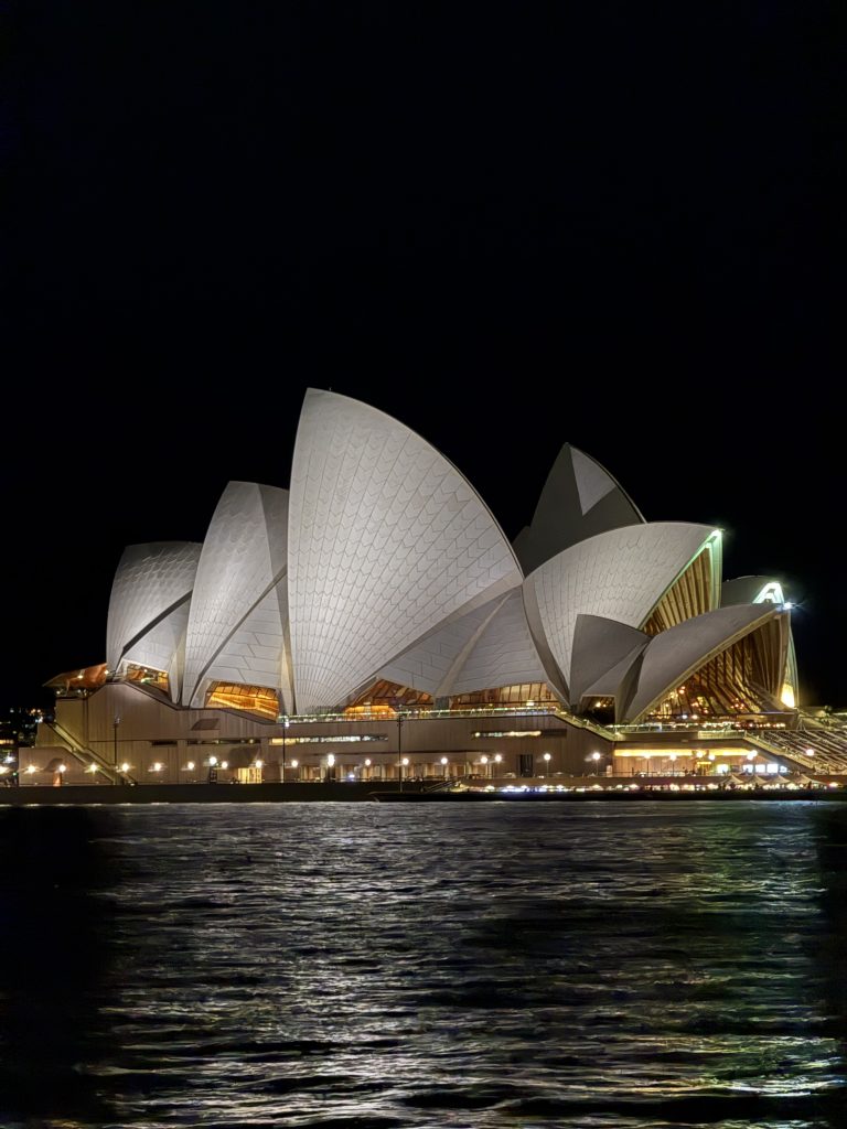 Photo taken by the author of the Sydney Opera House at night while on her 3-day Sydney itinerary adventure.
