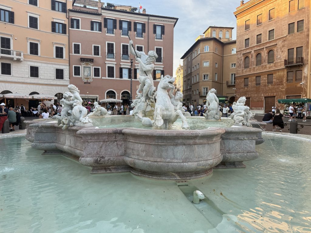 Photo of one of the fountains in the Piazza Navona taken by the author on her trip to Rome. Showcasing what a 3-day Rome itinerary can look like.