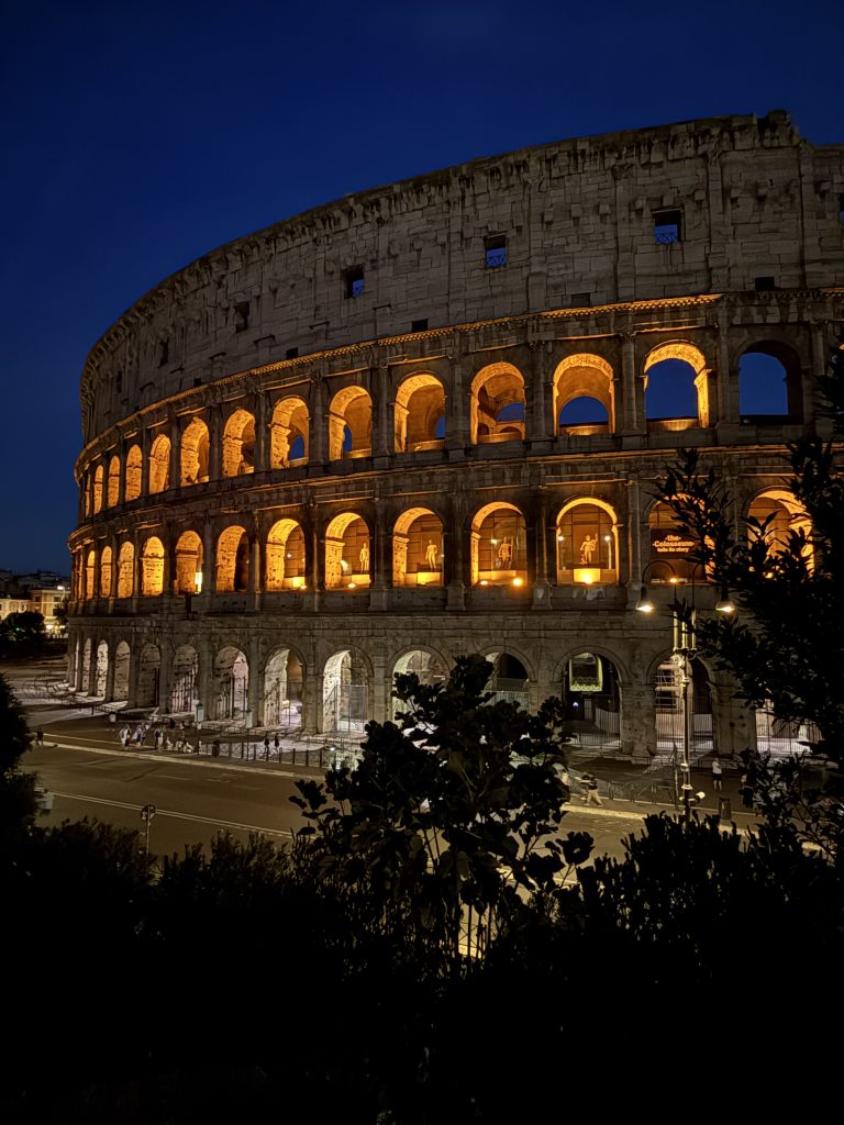 Photo of one of the Colosseum at night taken by the author on her trip to Rome. Showcasing what a 3-day Rome itinerary can look like.