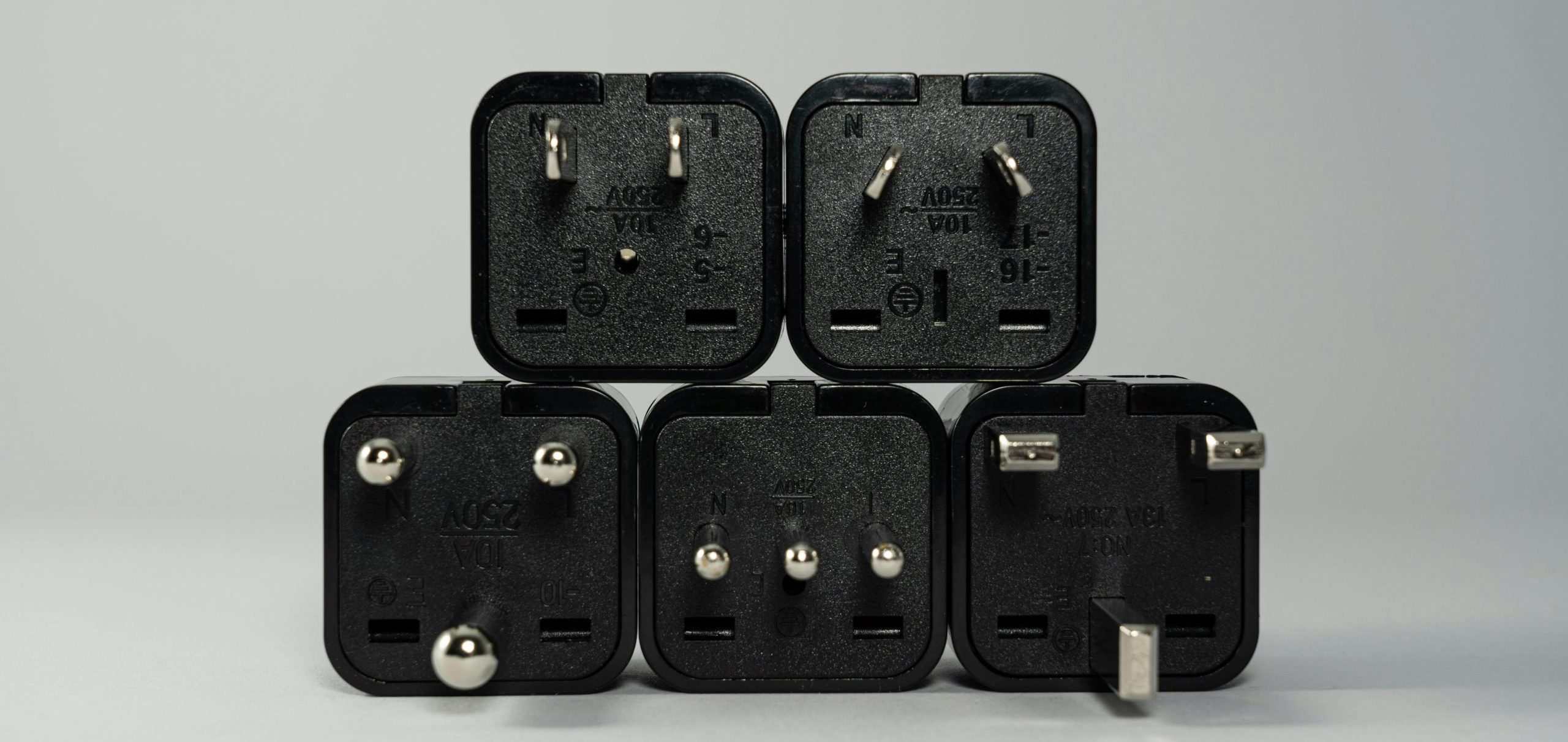 pexels-castorlystock-3639031 Photo of various prongs for outlets from different countries. Just another reason to make sure you have a travel adapter as part of your travel packing essentials list. Photo by Castorly Stock