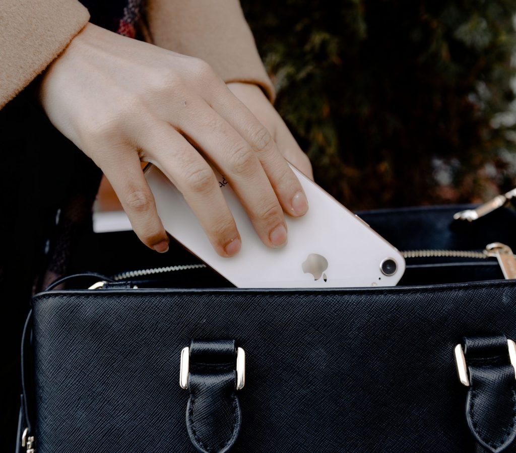 Packing your cell phone in your personal item.